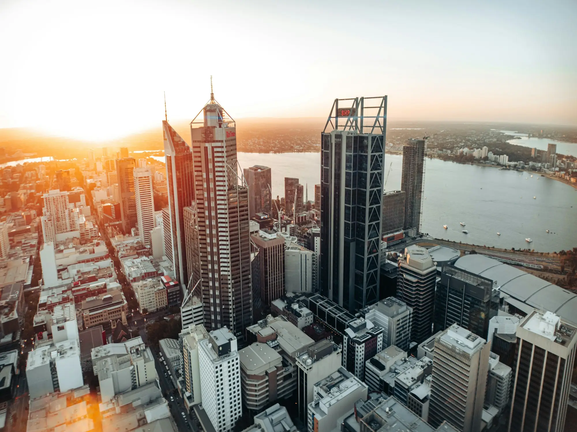 Perth CBD office towers and the Swan River at sunrise